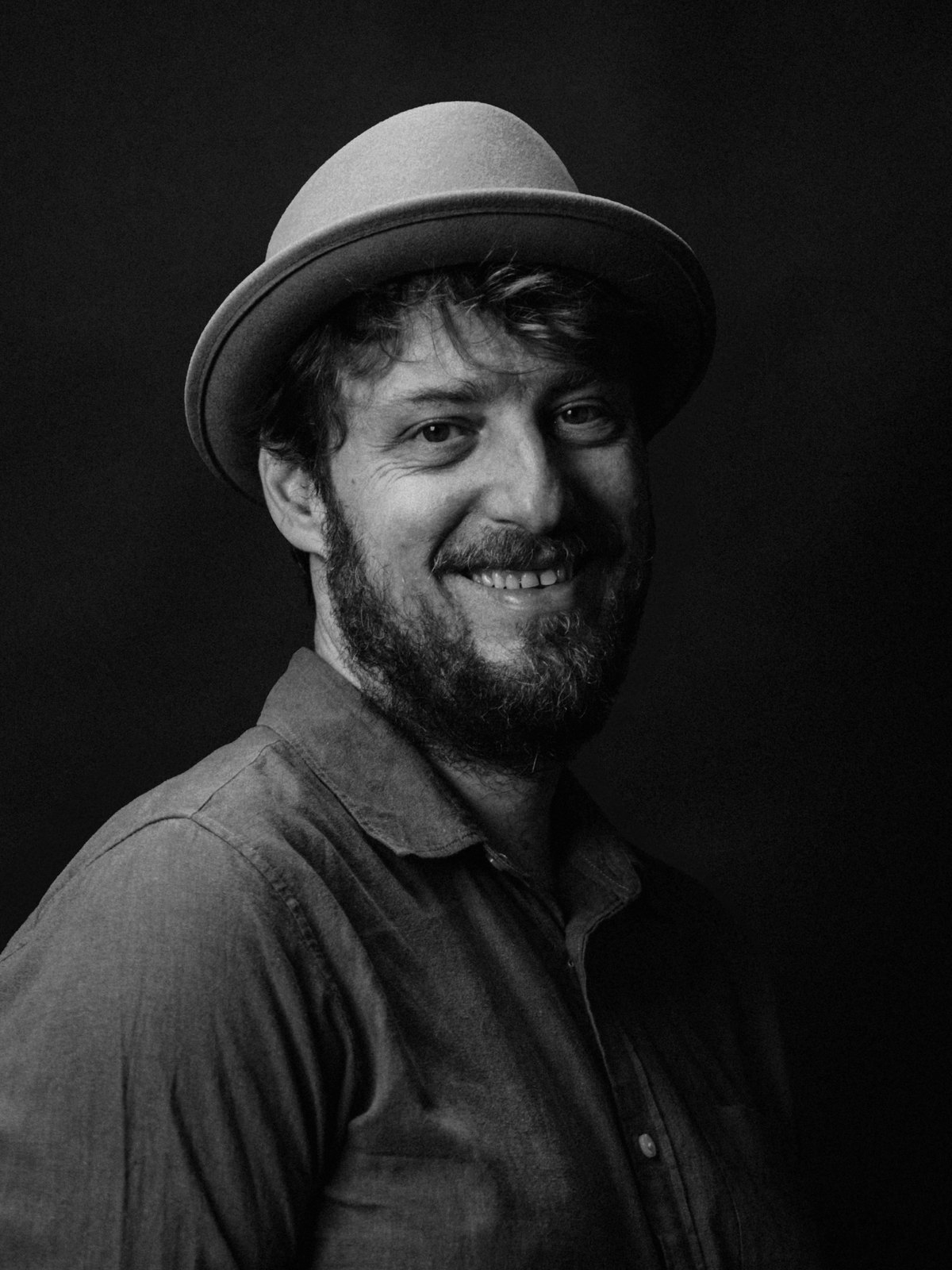Portrait of Evan Vamvakos, co-founder and AI creative director at DelVam