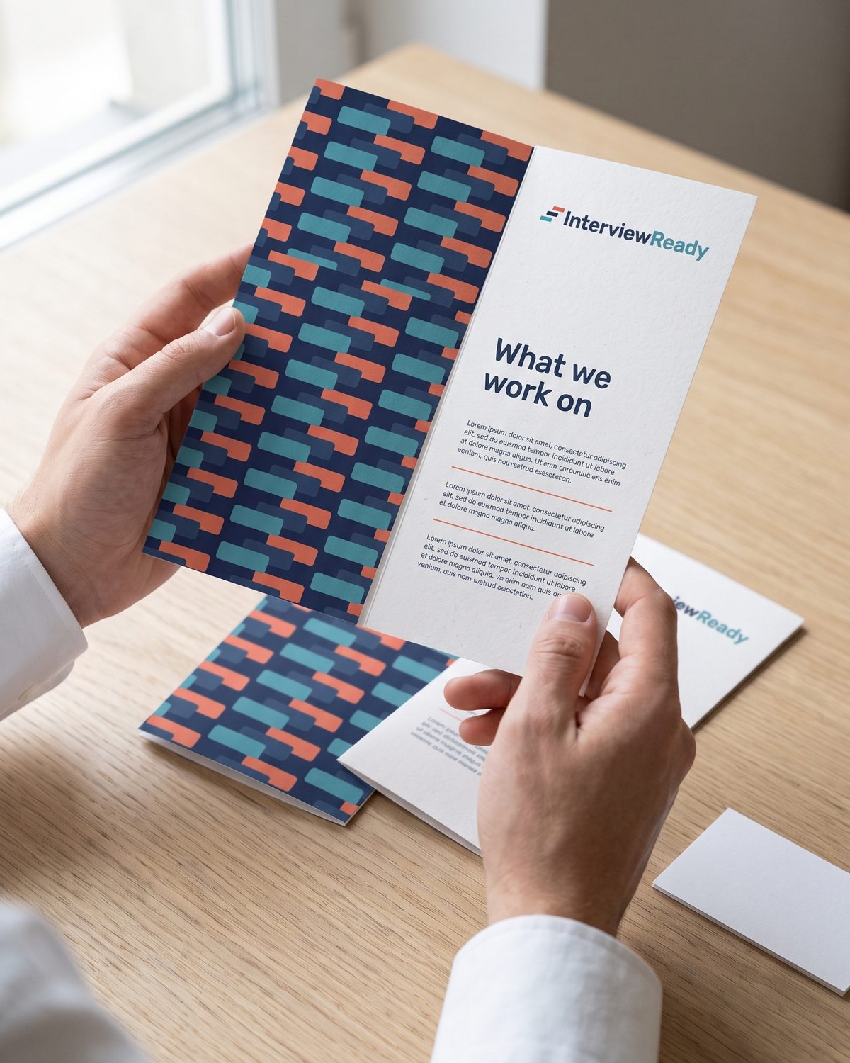 Tri-fold brochure with the brand pattern