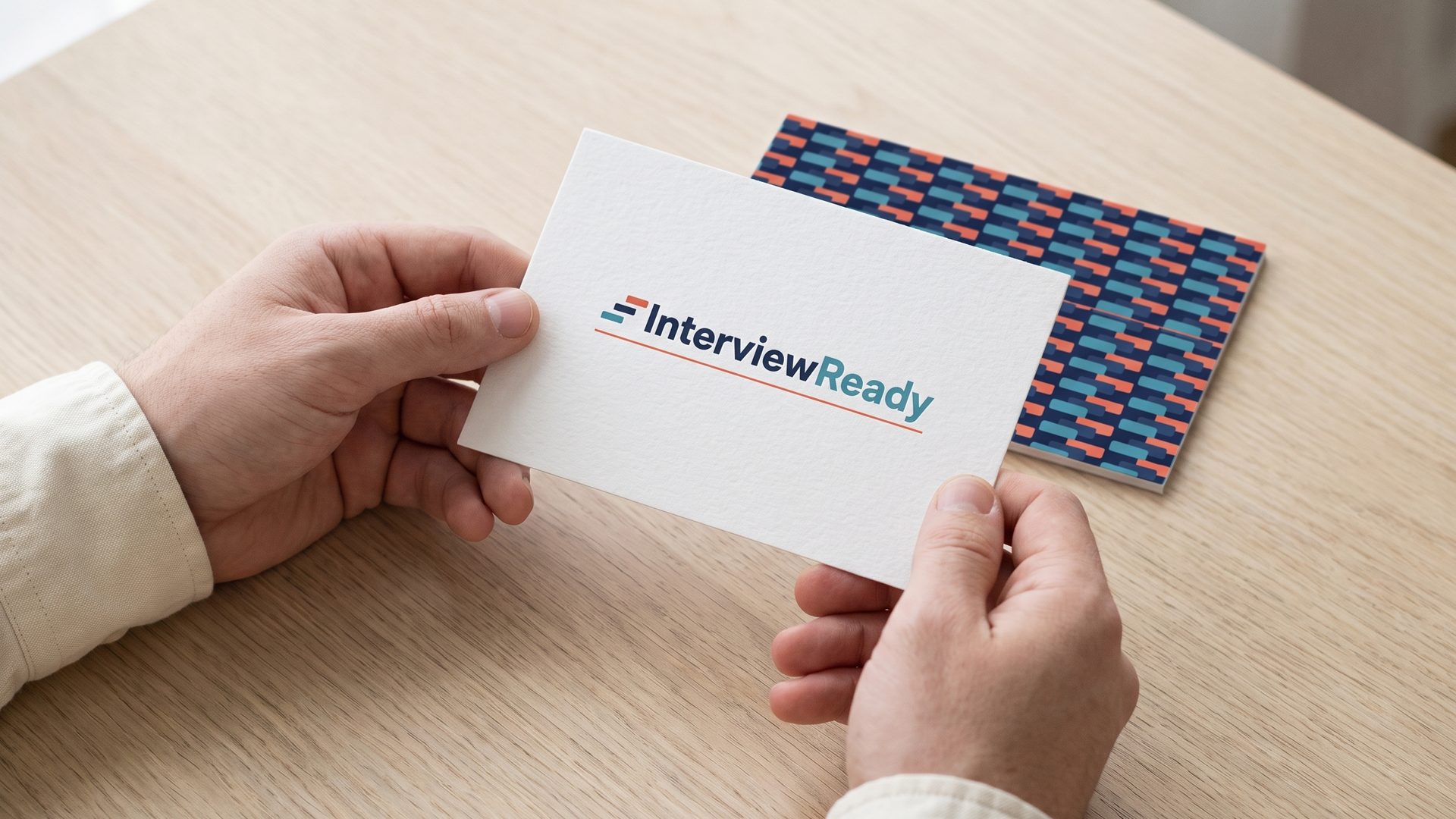Business card held in hand